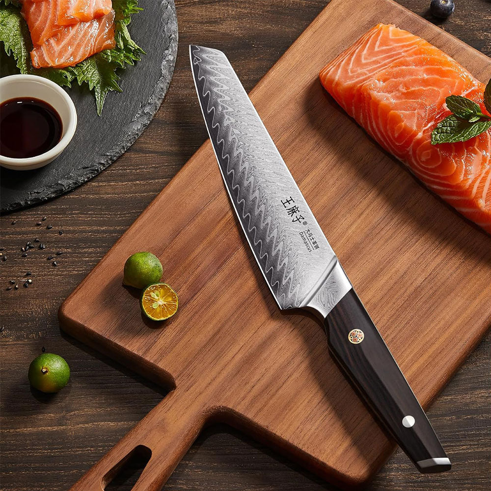 A long, narrow blade designed for slicing thin, even cuts of meat, often used for carving roasted meats or poultry. The Damascus carving knife is made from high-carbon Damascus steel for superior edge retention and precision. The chef’s knife blade is typically long and thin with the signature Damascus pattern, allowing for smooth, controlled slicing.