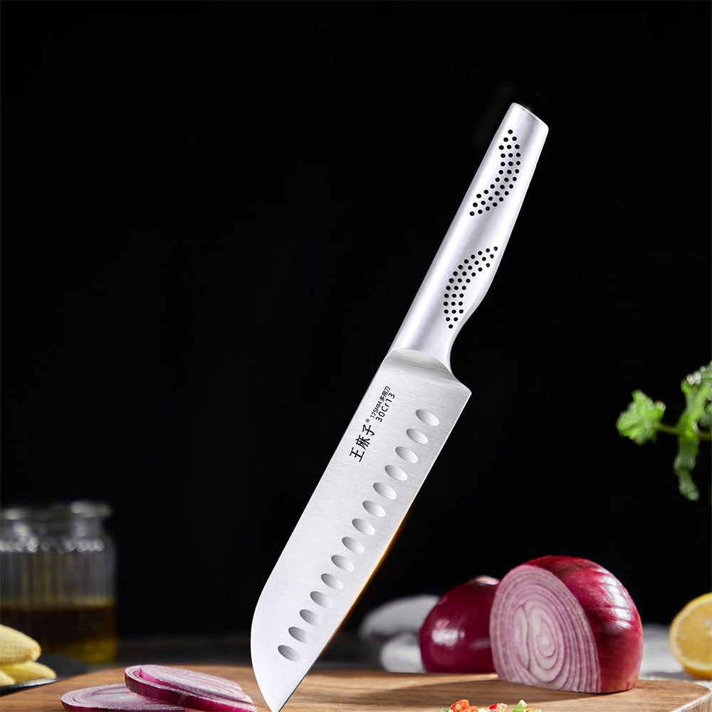 This sharp Santoku knife is an excellent chef's knife, suitable for handling a variety of ingredients. Its high-quality blade ensures smooth cutting, making it easy to chop vegetables, slice meat, or mince ingredients. It is the ideal choice for every chef.
