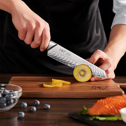 This smaller and more delicate than a chef knife, the fruit knife is designed specifically for peeling, cutting, and slicing fruits and vegetables. Like the chef knife, it is crafted from Damascus steel, providing excellent sharpness for precision cutting.Wooden and ergonomic, designed for easy handling and precise cuts.